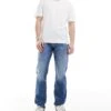 Calvin Klein Jeans Slim Straight Jeans In Mid Wash For Men Denim Medium